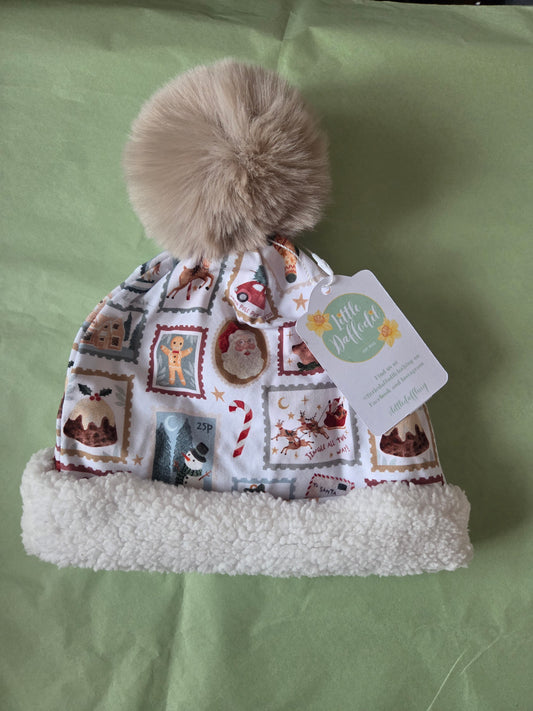 Child (age 4+) christmas stamps bobble hat